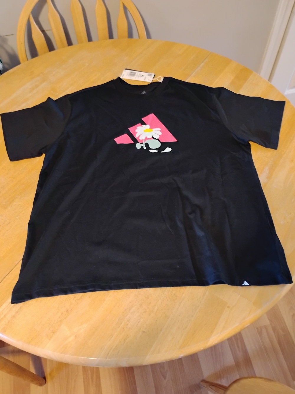 Women's Adidas Black Short-Sleeve Tee with Pink Daisy Logo